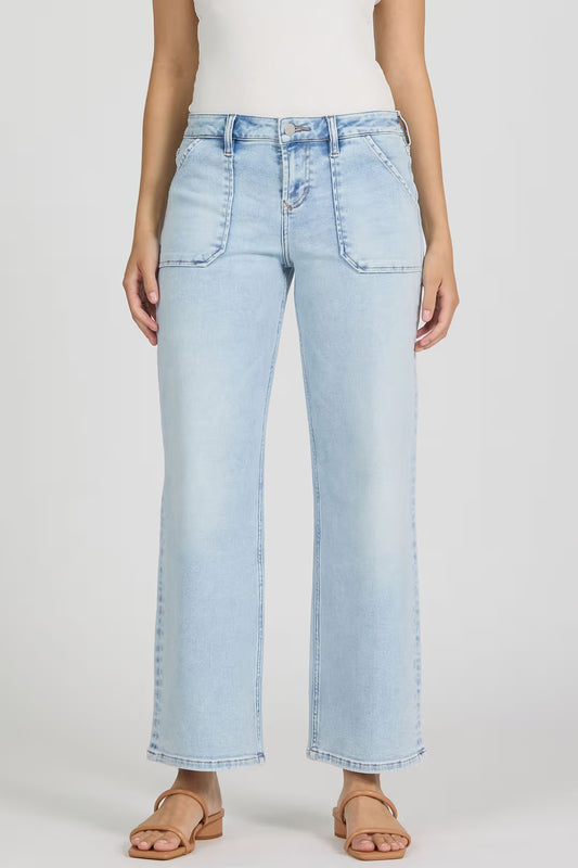 Light blue jeans worn by a person on a white background