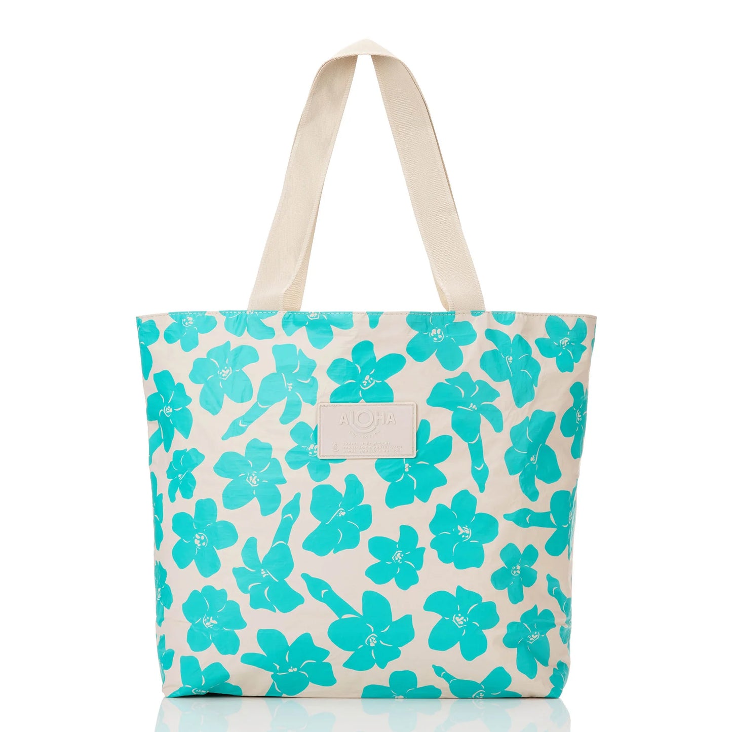 Tote bag with turquoise floral pattern on a white background