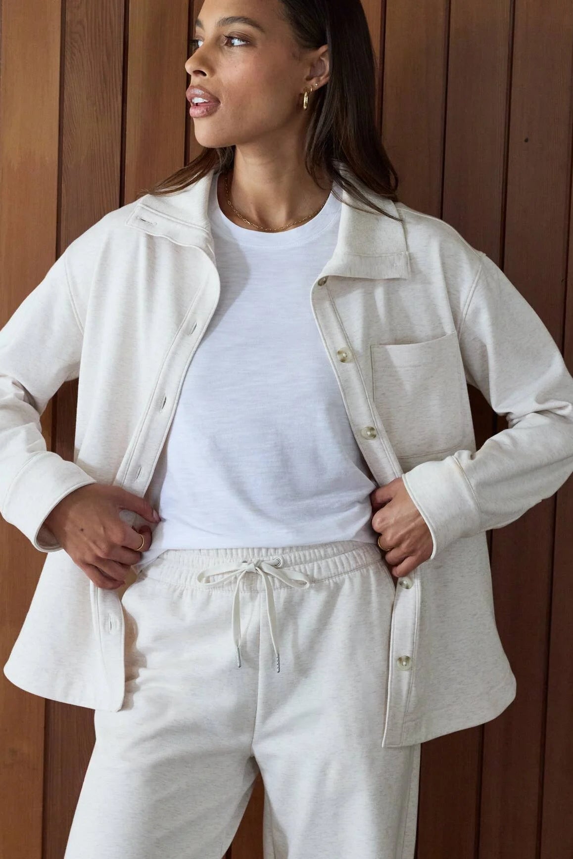 woman in button up shirt and pants