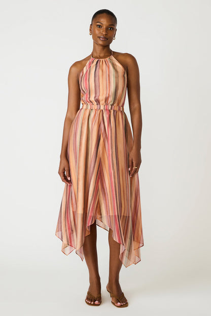 Woman wearing a striped dress on a white background