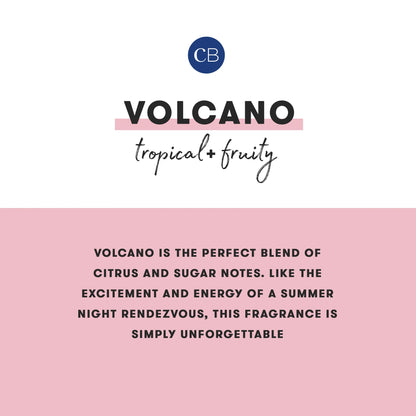 Product packaging for 'Volcano' fragrance with brand logo and description on a pink background.