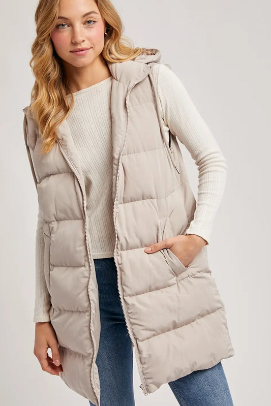 woman in puffer vest
