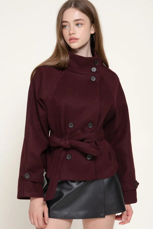 woman in button jaacket and skirt 