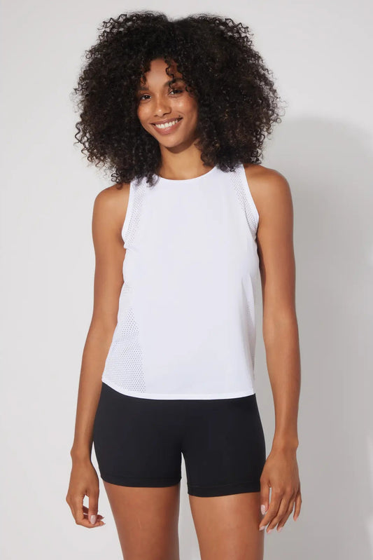 woman wearing white tank top and black shorts