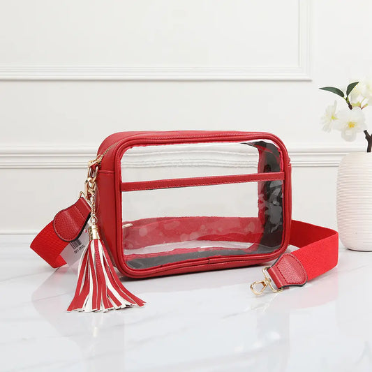 Red clear pouch with a tassel on a white surface