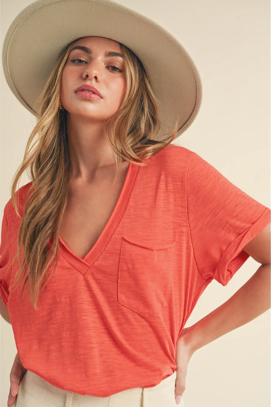 woman wearing v neck tee with hat 