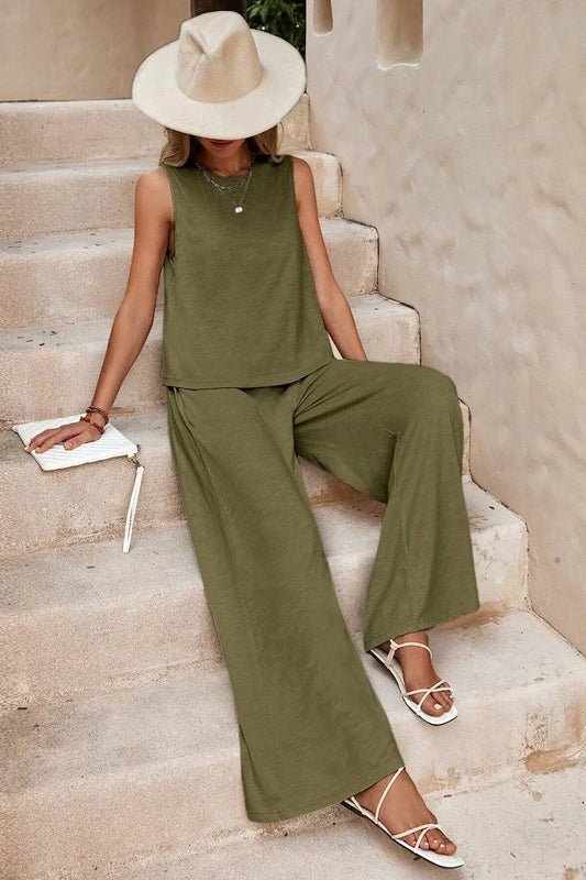 woman wearing matching green tank and pants