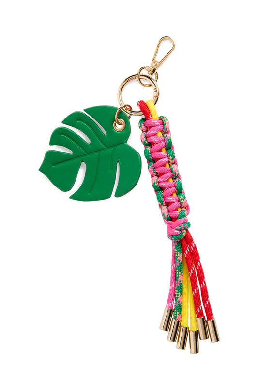 Keychain with green leaf charm and colorful tassels on a white background