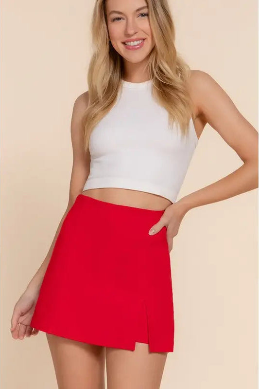 woman wearing red skirt with white top 