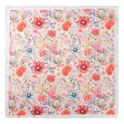 Floral patterned fabric with red, pink, and blue flowers on a white background