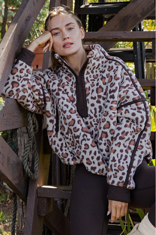 woman in animal print pullover