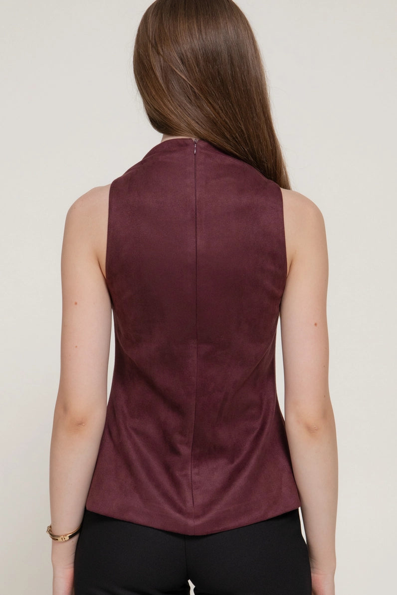 woman wearing burgundy top