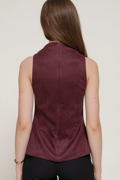 woman wearing burgundy top