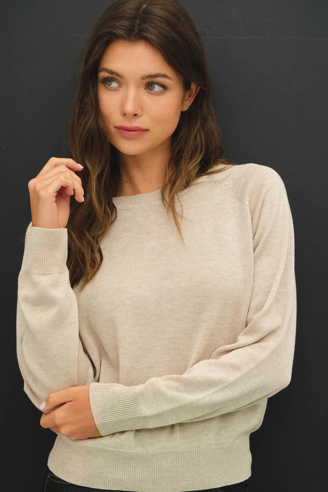 woman in tan sweater