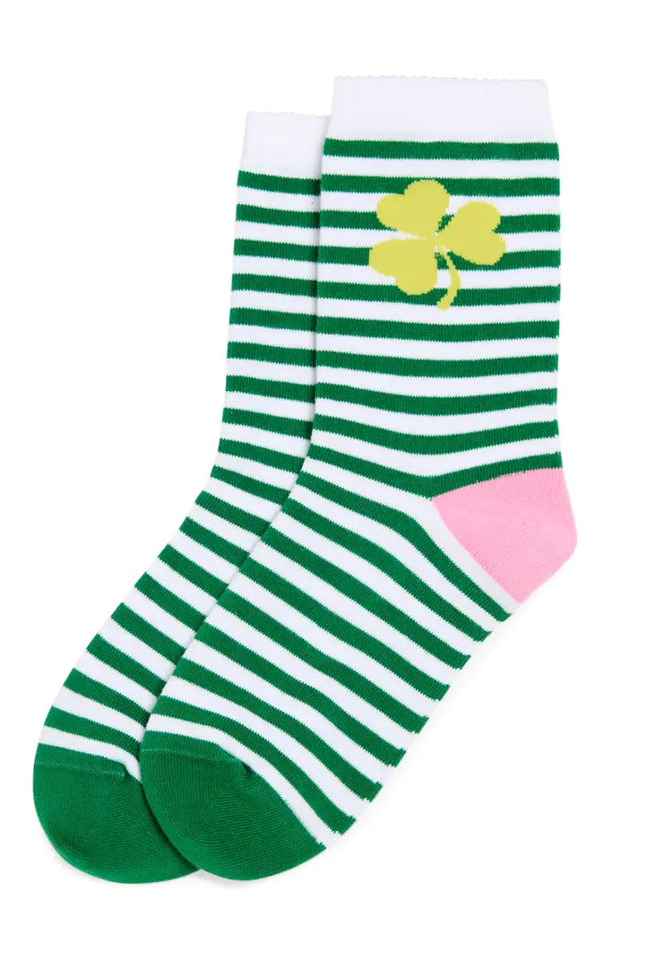 Green and white striped socks with a yellow clover and pink heel on a white background