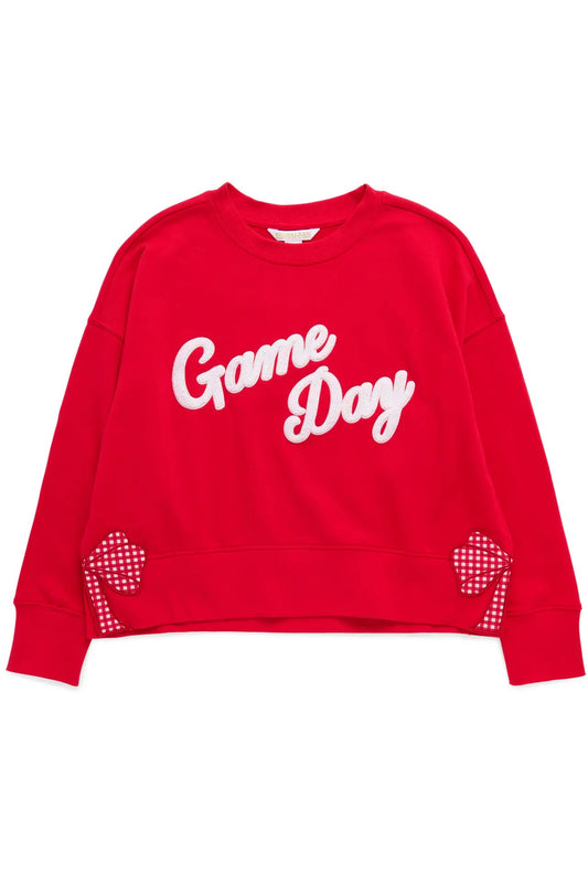 A bright red crewneck sweatshirt featuring 'Game Day' written in white script across the chest, with red and white checkered heart details on the lower sleeves, shown against a plain white background.