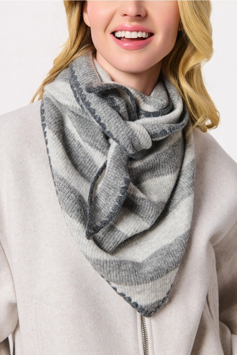 woman wearing scarf and sweater