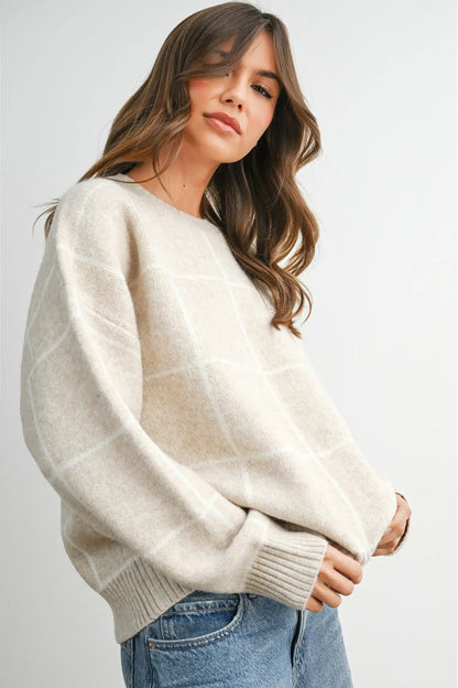 woman in checkk sweater