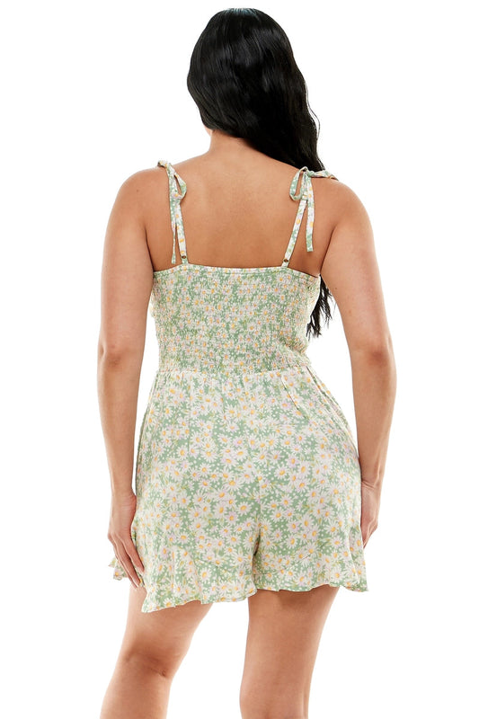 Woman wearing a floral dress on a white background