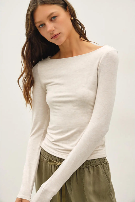 woman in long sleeve top 