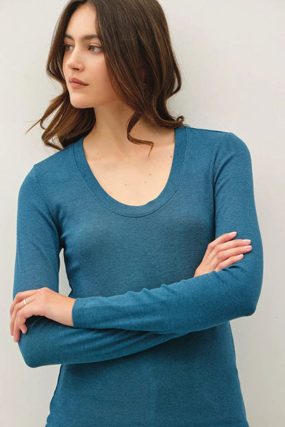 woman in long sleeve top