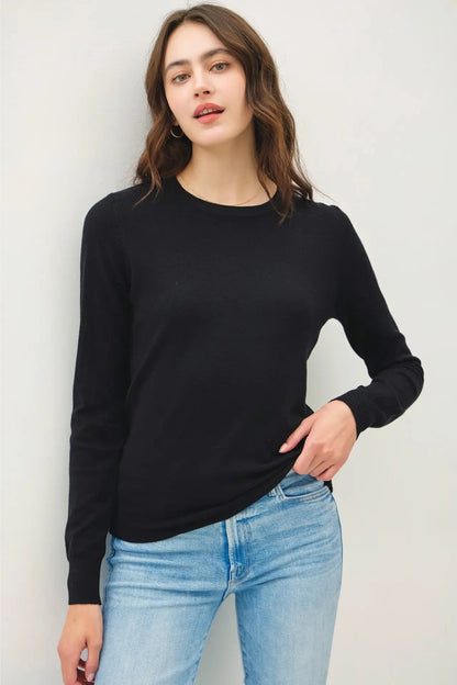 woman wearing sweater with jeans 