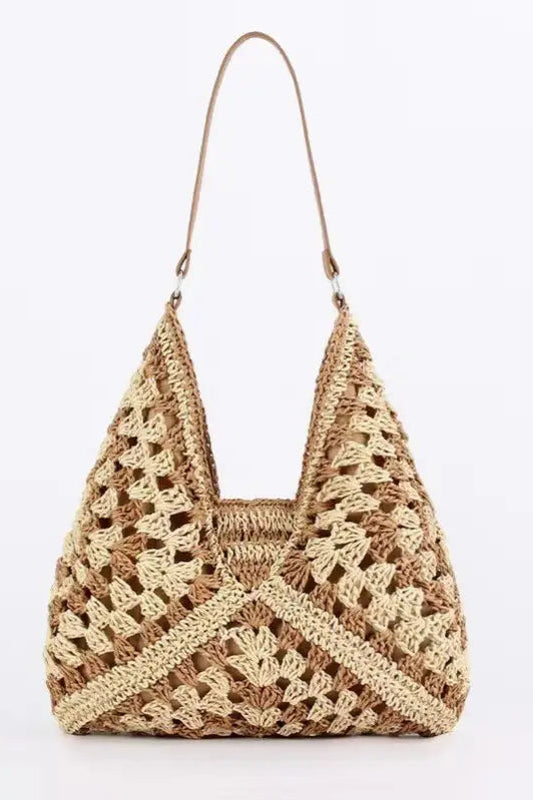 Woven handbag with a geometric pattern on a white background