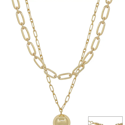 Gold chain necklace with a pendant on a white background