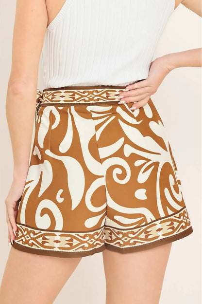 back view of person wearing tan print skort