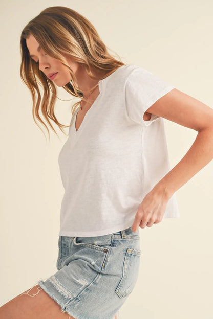 woman wearing boxy tee with jeans
