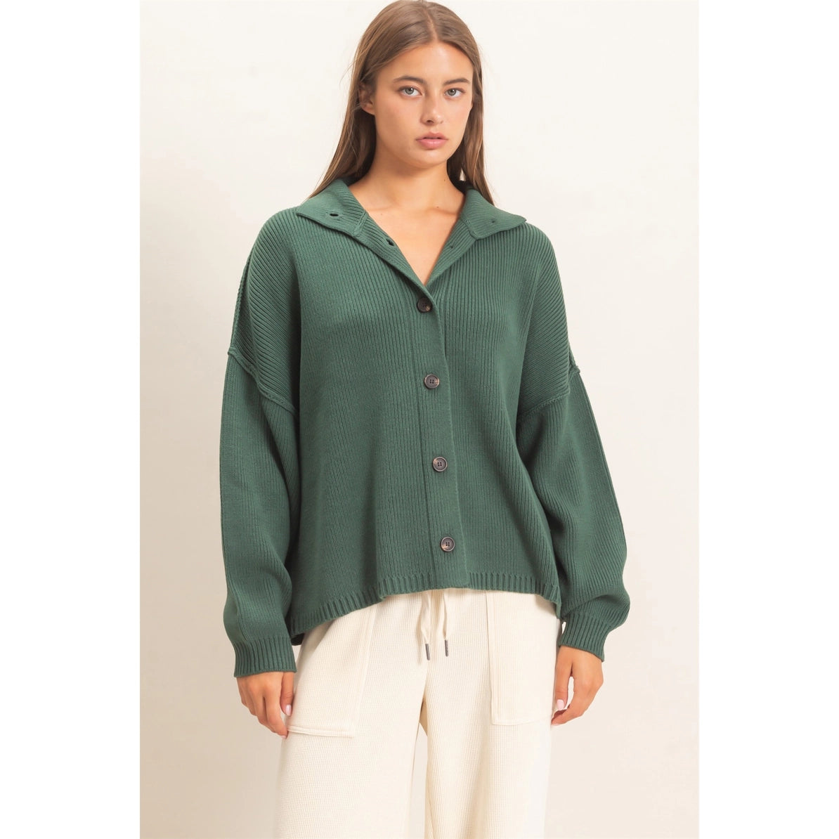 woman wearing green cardigan 