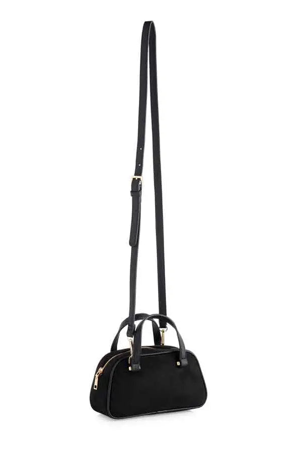 A black dome-shaped handbag with a long shoulder strap, dual top handles, and gold-tone hardware, shown against a plain white background.