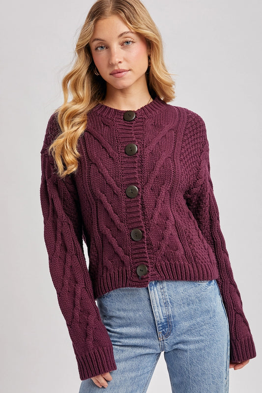 woman wearing cardigan and jeans