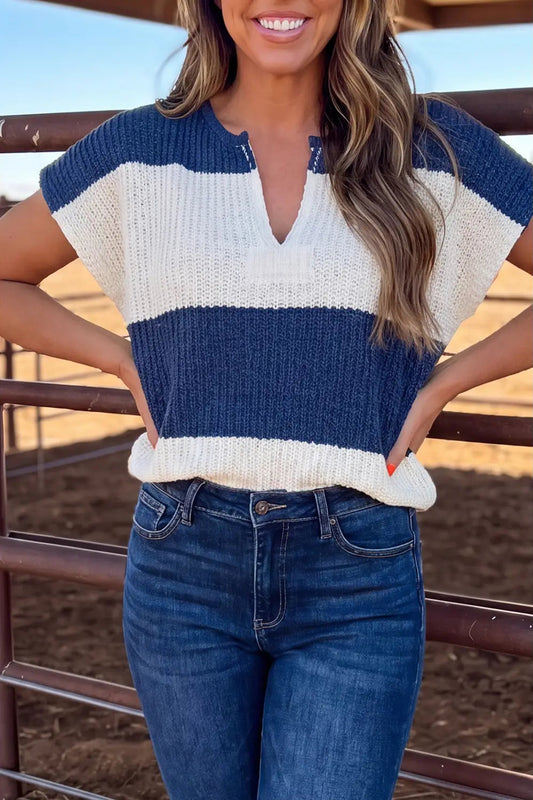 woman wearing blue and white sweater with jeans