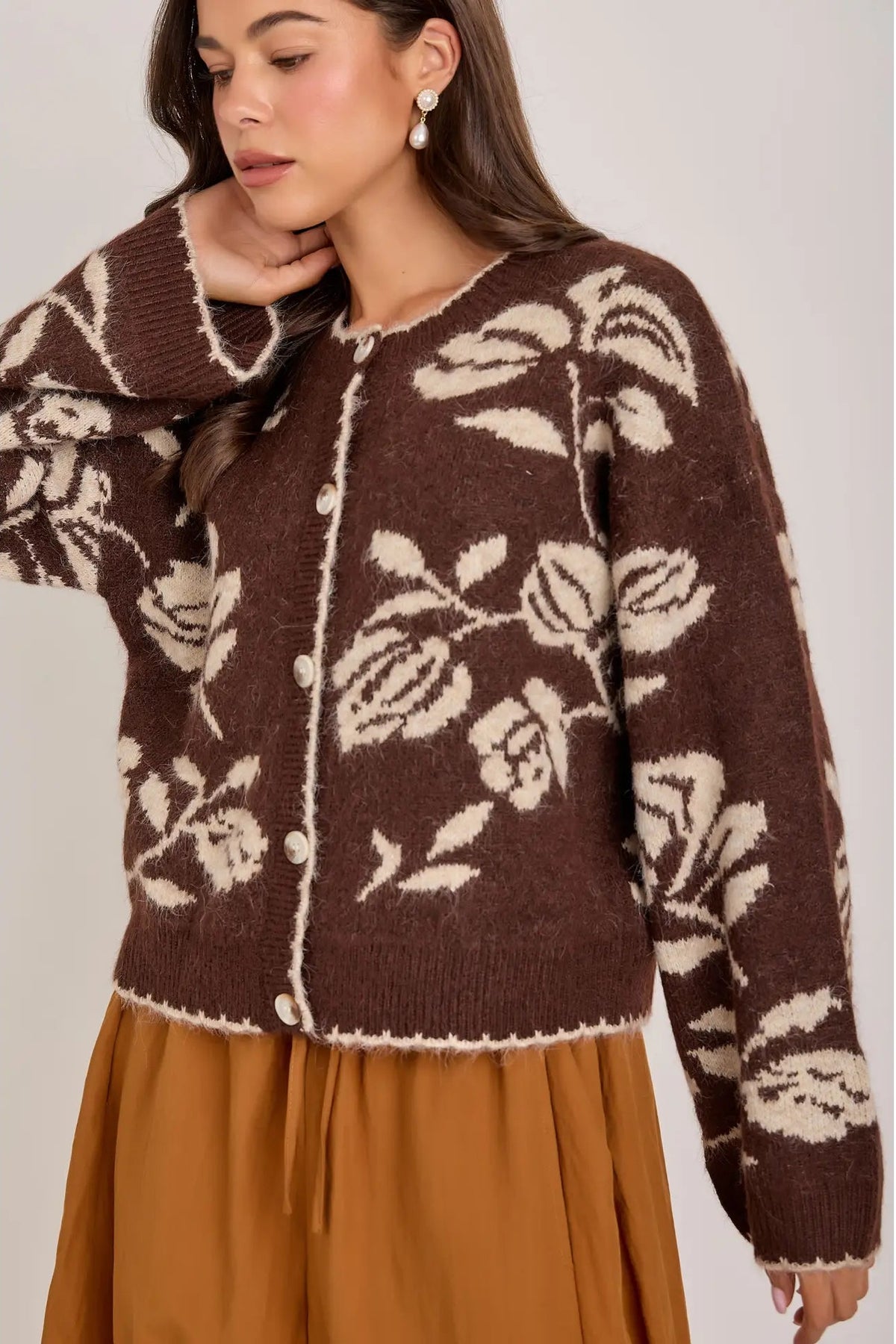 woman in floral cardi and skirt 
