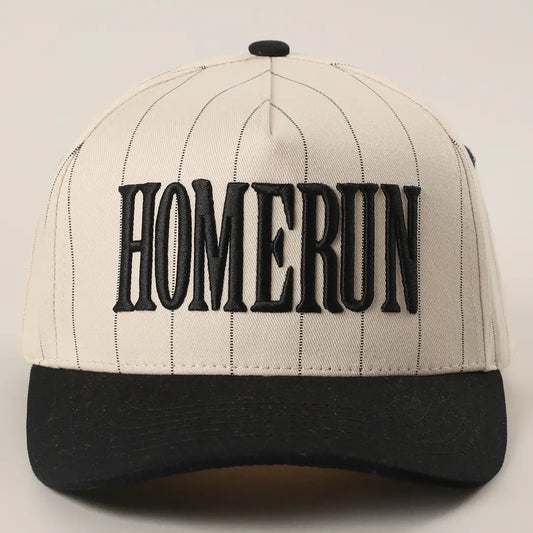 Baseball cap with 'HOMERUN' text on a plain background