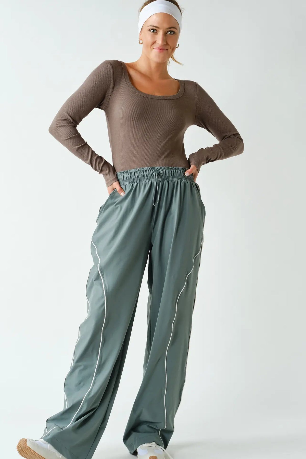 woman in long sleeve tee and pants