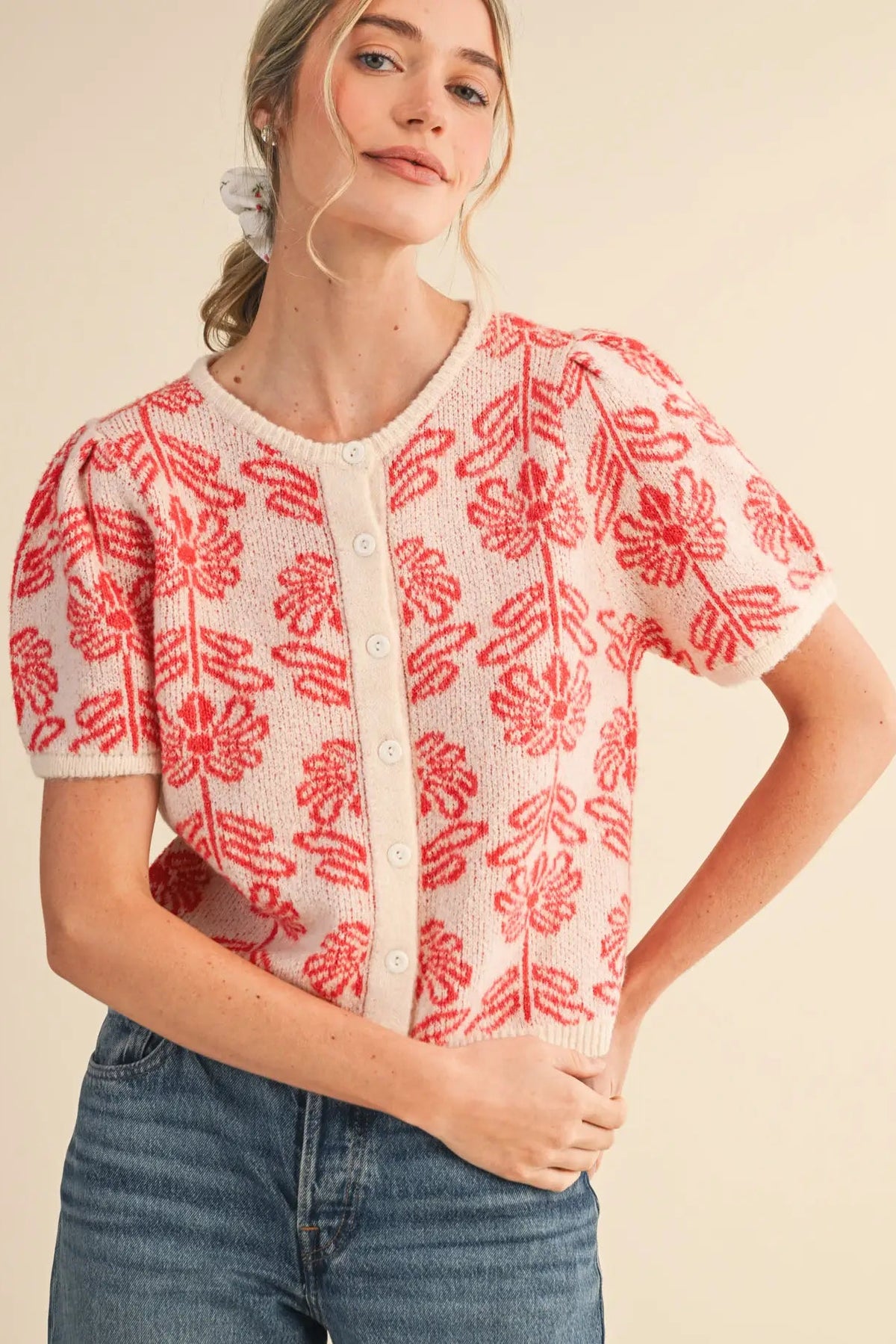 woman in floral cardigan