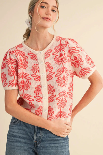 woman in floral cardigan