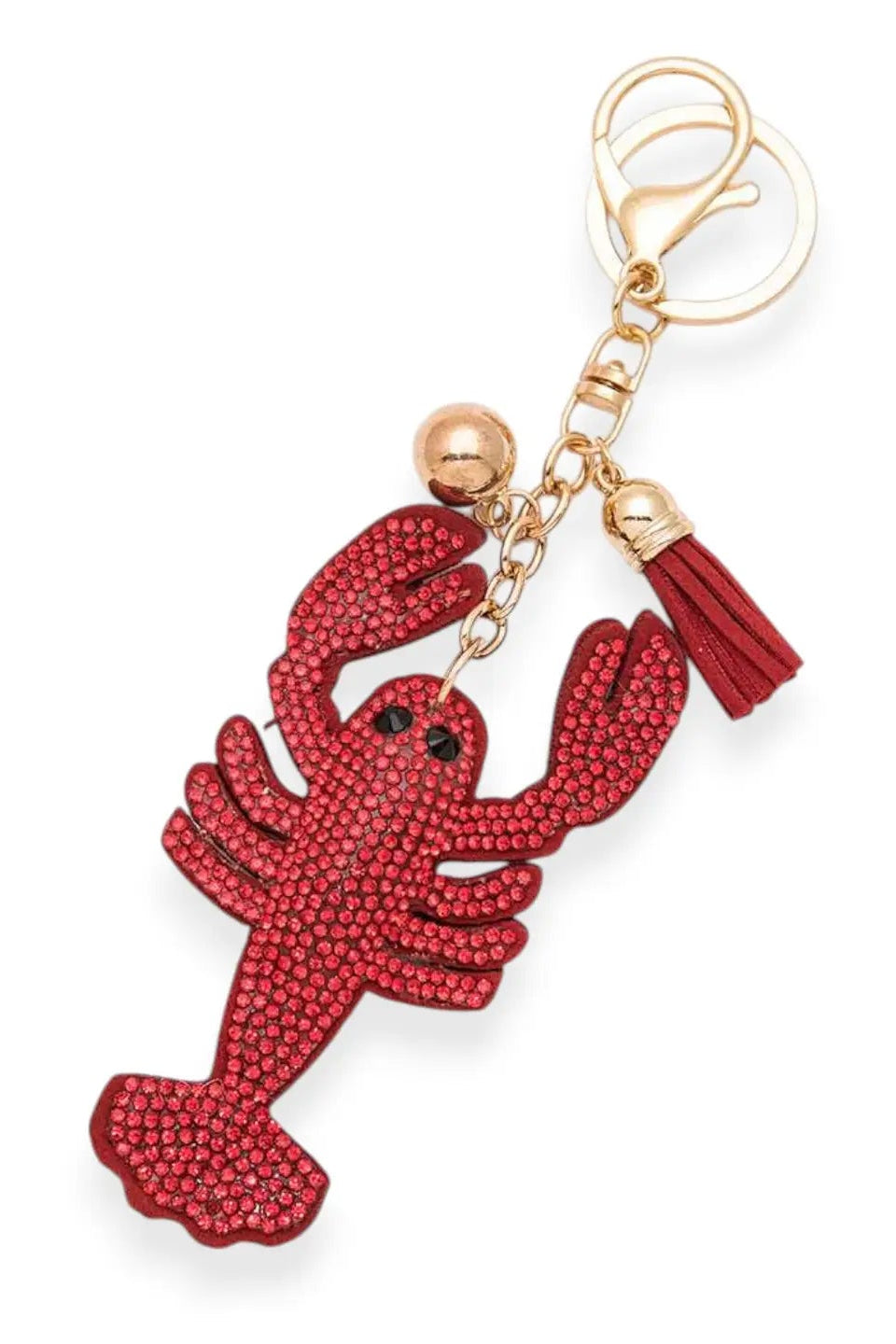 Red lobster keychain with gold accents on a white background