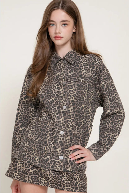 woman in leopard print jacket and skirt 
