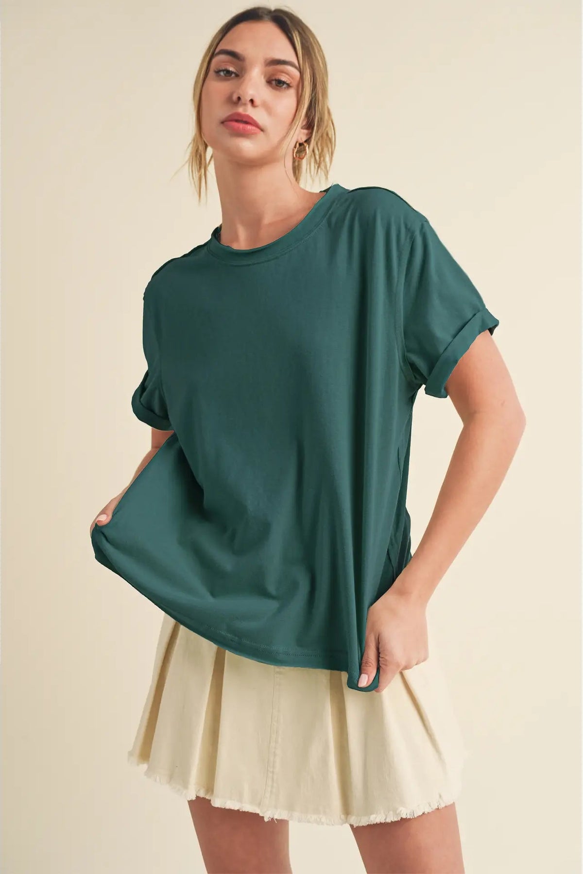 woman in tee and skirt