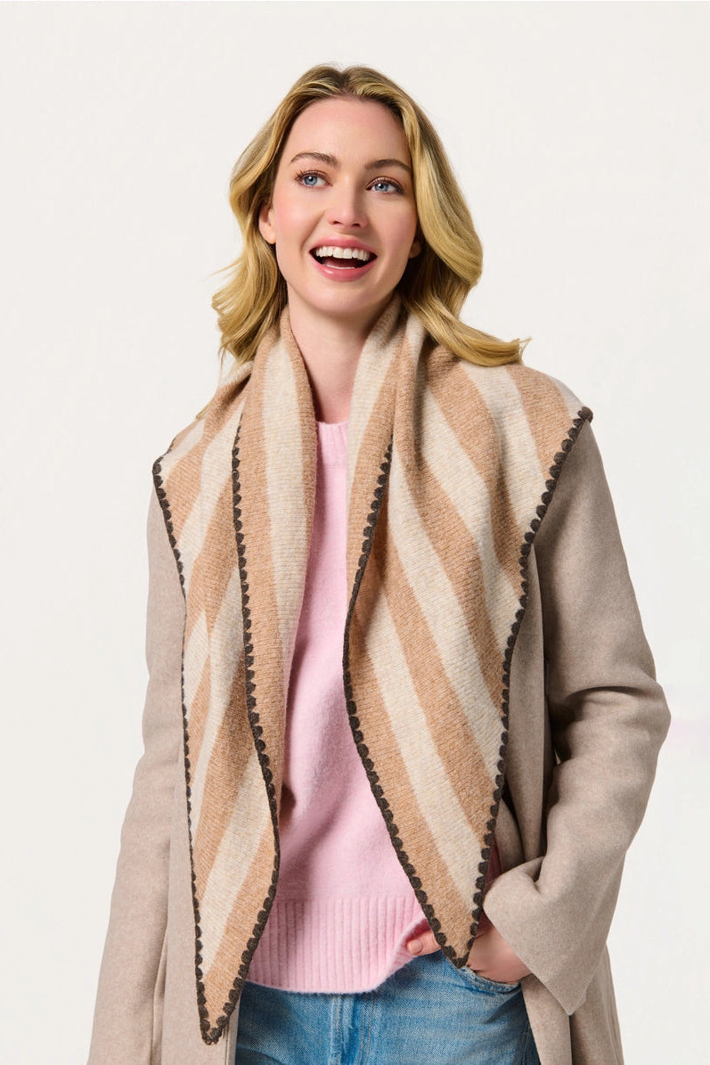 woman wearing scarf and sweater
