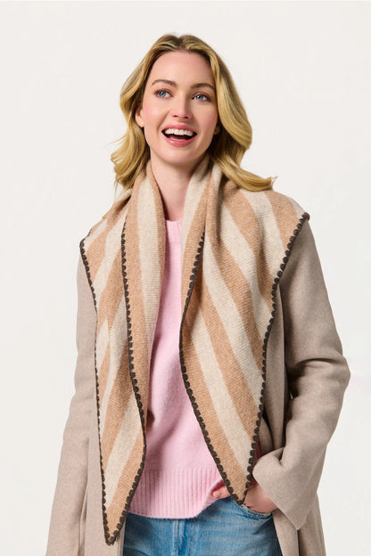 woman wearing scarf and sweater