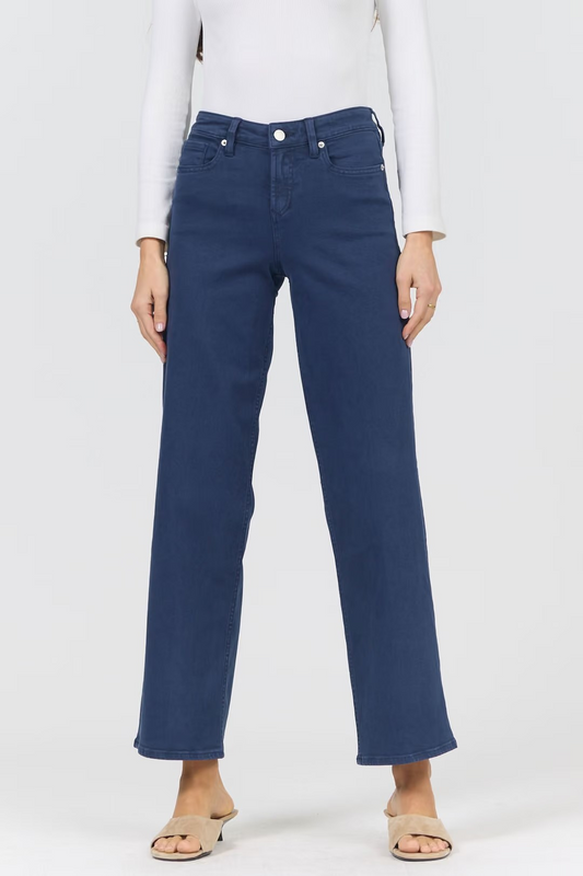 Person wearing blue jeans on a white background