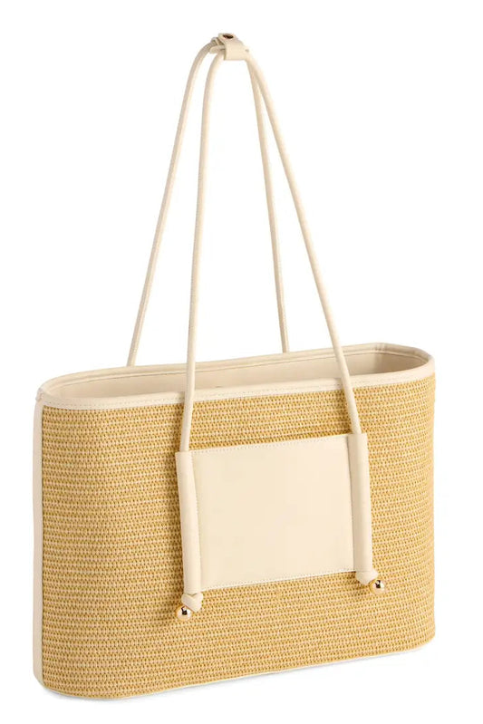 Woven handbag with beige handle on a white background