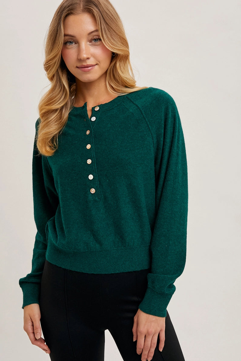 woman in henley sweater