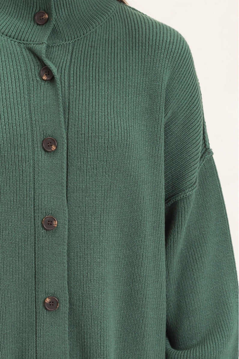 woman wearing green cardigan 