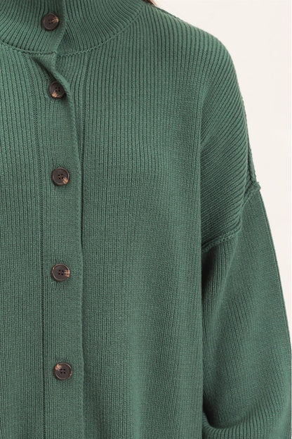 woman wearing green cardigan 