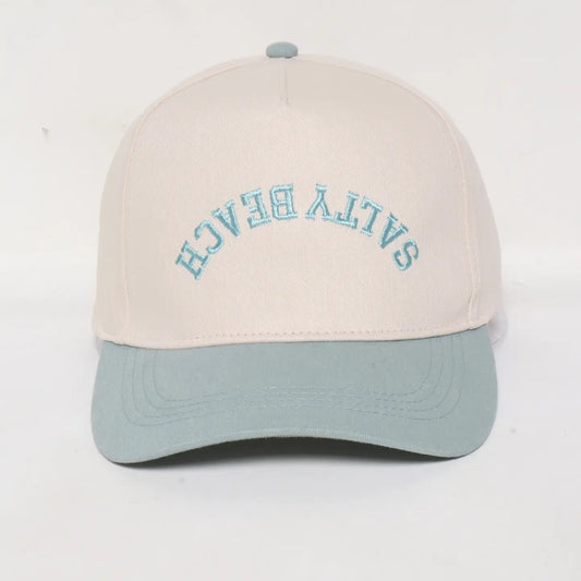 baseball hat with salty beach backwards on the front